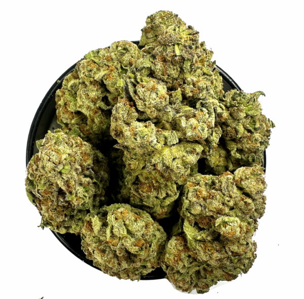 King Kush trichome-rich bud under soft light