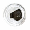 Close-up of traditional Moroccan hash showcasing its sticky consistency"