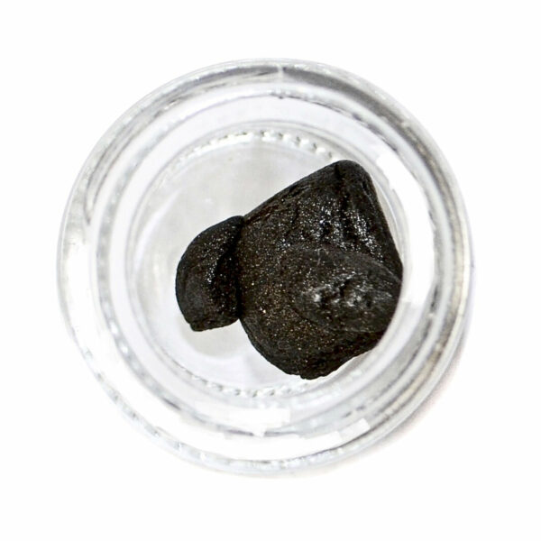 Close-up of traditional Moroccan hash showcasing its sticky consistency"