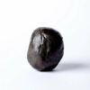 Close-up of traditional Moroccan hash showcasing its sticky consistency" "Moroccan hash crumbled on parchment paper ready for consumption" "Soft and pliable Moroccan hash highlighting its artisanal quality